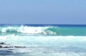 Surfers in December at Lyman's along Alii Drive. File photo.