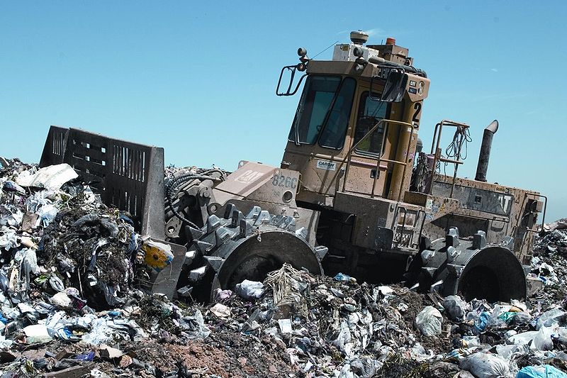 Heavy machinery at work at a landfill