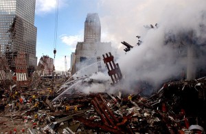 The ruins of the World Trade Center in New York continued to smoulder two days after the attacks. Wikimedia Commons photo.