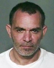 44 year-old Ted Barney John, sought by police. Image courtesy HPD.