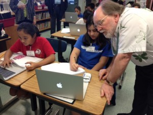 Gov. Neil Abercrombie meeting in February with Keaau Elementary students involved in a digital learning pilot program. File photo.