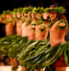 A kane or men's halau performs in a previous kahiko competition.