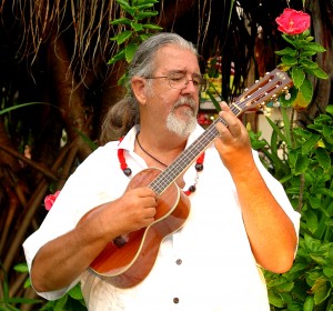 Local musician Robert Yates, known as Uncle "Uke," offers handcrafted ukuleles at his new store. Photo courtesy of the Kings' Shops. 