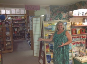 Christine Reed, owner of Basically Books, shows the expanded retail area within the Hilo store. Photo credit Basically Books. 