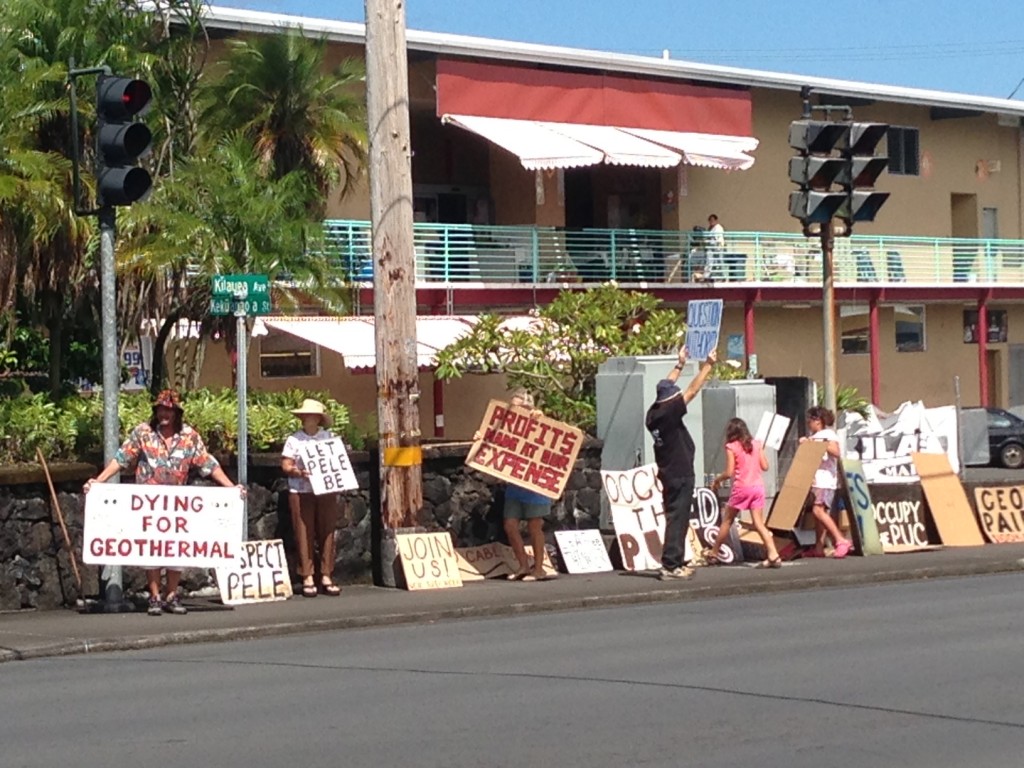 A group of protesters await the arrival of "Occupy HELCO" marchers at the company's Hilo headquarters August 19. Photo by Nate Gaddis.