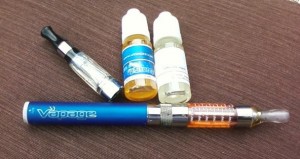E-cigarettes, including those that dispense vapor without nicotine, are included in the law changes. File photo.