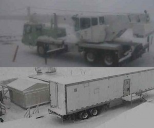 Snow was starting to build on the Big Island's summits, as can be seen in these photos taken at about 5:30 p.m. Top: a view from the Canada-France-Hawaii Telescope; Bottom: the scene at the Mauna Loa Observatory.