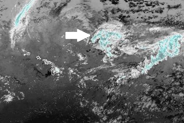 The arrow in this infrared satellite image shows the low-pressure system that has moved to the east of the Big Island. NOAA/NWS image.