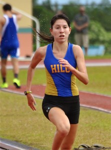 Hilo's Carmen Garson-Shumway runs during a BIIF event at Kea`au High School. Photo credit: Jared Fujisaki.