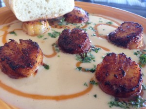 Pineapple's seared scallops with mango chili butter ($11). Photo by Nate Gaddis