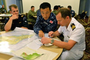 RIMPAC personnel planning humanitarian assistance and disaster relief exercises. US Navy photo.