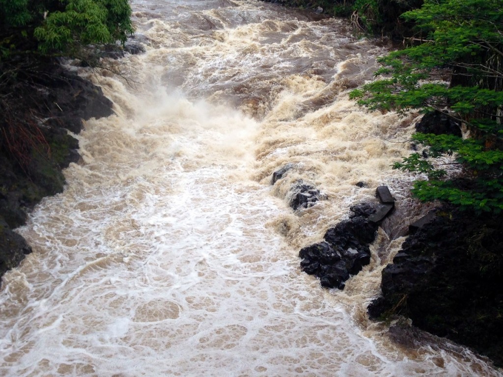 Wailuku River rages as rain begins to fall during Hurricane Iselle. Photo by Nate Gaddis.