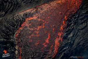 The surface of this pahoehoe breakout cools rapidly, creating a wrinkly skin as shown in this photo taken on Jan. 10.  Photo: Extreme Exposure Media/Paradise Helicopters.