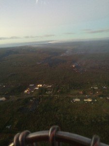 This Hawai'i County Civil Defense photo taken on Jan. 22 at 6:30 a.m. shows a view looking upslope from Pahoa Marketplace and Pahoa Fire and Police Stations. Civil Defense photo.