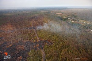 This photo taken on Jan. 16 shows that the new active and advancing breakout has crossed the firebreak and was about the same distance from Hwy 130 as the stalled distal tip, Thursday. Photo: Extreme Exposure Media/Paradise Helicopters.