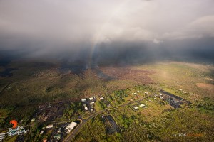 A rainbow shines above the distal portion of the June 27 lava flow in this overflight photo taken on Jan. 28. Photo credit: Extreme Media Exposure/Paradise Helicopters.