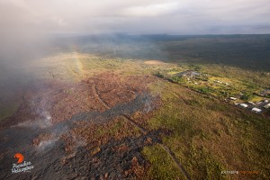 This overflight photo taken on Jan. 28 captured a rainbow above the lava bed. Photo credit: Extreme Exposure Media/Paradise Helicopters.