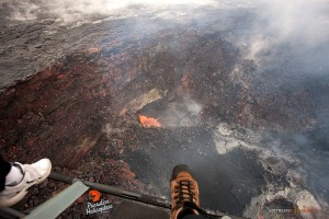 In this photo taken on Jan. 28 you can see some slight action in Pu‘u ‘O‘o as a little lava pond is visible against the southeastern wall of the crater. Photo credit: Extreme Exposure Media/Paradise Helicopters.