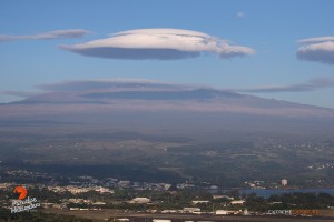 Seen in this photo, taken Feb. 13, high altitude winds created lenticular clouds over the eastern slopes and summits of Mauna Kea and Mauna Loa. Photo credit: Extreme Exposure Media/Paradise Helicopters.