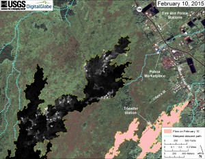 This map overlays a georegistered mosaic of thermal images collected during a helicopter overflight of the distal part of Kīlauea’s active East Rift Zone lava flow on February 10 at about 12:30 PM. The base image is a satellite image acquired in March 2014 (provided by Digital Globe). The perimeter of the flow at that time is outlined in yellow. Temperature in the thermal image is displayed as gray-scale values, with the brightest pixels indicating the hottest areas (white shows active breakouts). The blue lines show steepest-descent paths calculated from a 1983 digital elevation model. USGS HVO map.