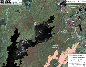 This map overlays a georegistered mosaic of thermal images collected during a helicopter overflight of the distal part of Kīlauea’s active East Rift Zone lava flow on February 19 at about 10:30 AM. The base image is a satellite image acquired in March 2014 (provided by Digital Globe). The perimeter of the flow at that time is outlined in yellow. Temperature in the thermal image is displayed as gray-scale values, with the brightest pixels indicating the hottest areas (white shows active breakouts). The blue lines show steepest-descent paths calculated from a 1983 digital elevation model. USGS HVO map.