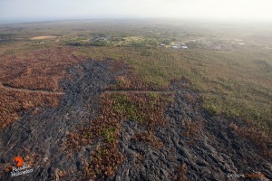 This photo taken on Feb. 6 shows virtually no activity is occurring in the vicinity of Pahoa, just a couple of smoldering spots about a mile upslope of the distal tip. Photo credit: Extreme Exposure/Paradise Helicopters.