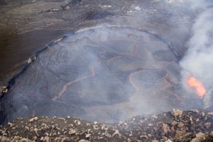 This photo shows the lava lake in the Overlook crater on the morning of April 26, when it reached to within 3 m (10 ft) of the floor of Halemaʻumaʻu. This is the highest the lava lake has reached during the current summit eruption. USGS/HVO photo.