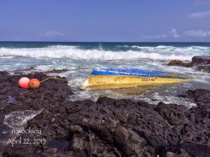 Overturned 20' skiff at Alan Davis shore, Oahu, reported April 22. Photo courtesy Nicole Woolsey and Ryan Tani.