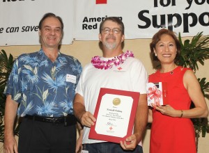 Photo of East Hawaii Volunteer of the Year Kenneth Cutting at Saturday’s Red Cross Heroes recognition event with award presenters Frank Richardson of Kaiser Permanente and Coralie Chun Matayoshi, CEO, Hawai'i Red Cross. Hawai'i Red Cross photo.