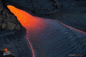 June 11: Lava pours out of a break in the wall of a lava tube. Photo: Extreme Exposure Media/Paradise Helicopters.