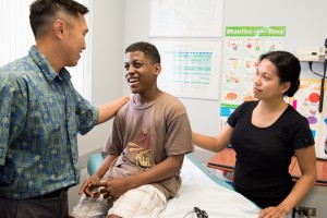 Shriners Hospitals for Children pediatric neurologist, Ryan Lee, M.D., with patient, Matthew Francis, 12, and mother, Michelle Miranda. Shriners Hospitals for Children courtesy photo.