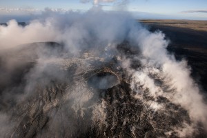 June 4: A little pond of lava was still visible within the collapse pit inside of Pu‘u ‘O‘o crater, while a couple of skylights were also glowing. Photo: Extreme Exposure Media/Paradise Helicopters.