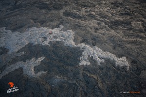 June 11: Breakouts were occurring throughout the flow field, with fingers of fresh silvery lava covering the old, darker flows. Photo: Extreme Exposure Media/Paradise Helicopters. 