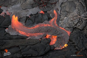July 23:   A little river of lava fills a low spot on the flow field.  Photo: Extreme Exposure Media/Paradise Helicopters.