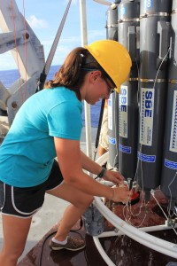 Student participant Julianna Diehl collects water samples from the central equatorial Pacific. Photo credit: SIO/Carlie Weiner.