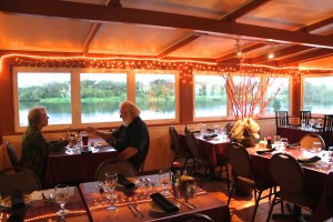 A couple is seen here dining at The Seaside Restaurant & Aqua Farm. 