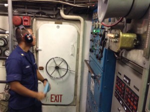 Electrician's Mate First Class Florito Conales in the Kiska's engine room.. Photo credit: Jamilia Epping.