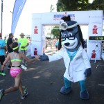 A young finisher is greeted at the finish line of the 2015 Ironkids Keiki Dip-n-Dash at Kailua Pier. Photo credit: UnitedHealthcare.