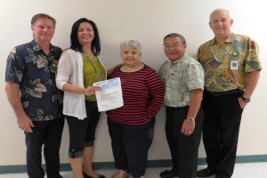 Kona Community Hospital and Kona Hospital Foundation leaders accept the grant from Reginald Morimoto with First Hawaiian Bank. in this photo. KCH courtesy photo.