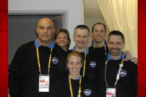 Dr. Geno Ortiz (left), along with members of the World's Massage Team. Go-Team Massage Clinic website photo. 