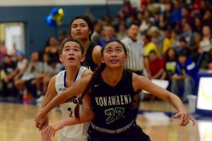 Konawaena's Celena Molina (22) boxes out for a rebound against Hilo's Sharry Pagan (2) during last Friday's game. Photo courtesy: Jared Fujisaki.