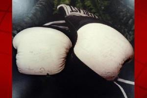 The Hawai'i Police Department is in search of a pair of Everlast boxing gloves with 1984 Olympic Games boxers and referee participant signatures. HPD provided image.
