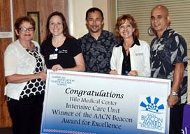 Hospital and Foundation leadership congratulate the ICE nursing staff for winning the Beacon Award for Excellence, a national recognition for intensive care until across the country. Hilo Medical Center courtesy photo.