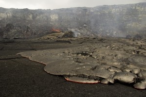  A vent in the southern portion of Puʻu ʻŌʻō Crater contained a small lava pond and was throwing spatter a short distance. USGS/HVO photo taken on March 4.