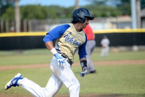 Hilo sophomore Micah Bello trots around the bases after hitting an inside-the-park home run earlier this year. Photo credit: Jared Fujisaki.