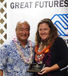 Donn Mende (Board Chair) presented Zavi Brees-Saunders (Chief Executive Officer) with an award for her leadership and service to Big Island youth. BGCBI courtesy photo.