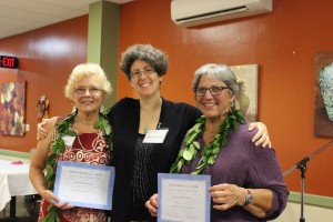 Kathy Hammes (left) and Evelyn Pacheco (right) received Volunteer of the Year certificates from Ku‘ikahi Mediation Center Executive Director Julie Mitchell . Ku'ikahi Mediation Center.