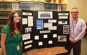 Supreme Court Law Library staff members Chelsea DeMott and Jason Weekley are pictured above with the Library’s “Law Day 2016: Miranda More Than Words” display. Hawai'i State Judiciary courtesy photo.