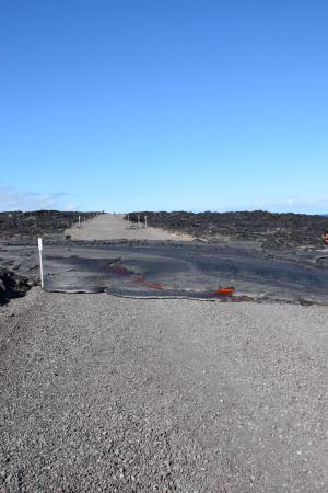 Flow 61G reached the emergency access road inside Hawai'i Volcanoes National Park on July 25 at 3:20 p.m. and crossed the road in about 30 minutes. At 4 p.m., the flow front was approximately 110 meters (.07 miles) from the ocean. USGS/HVO photo.