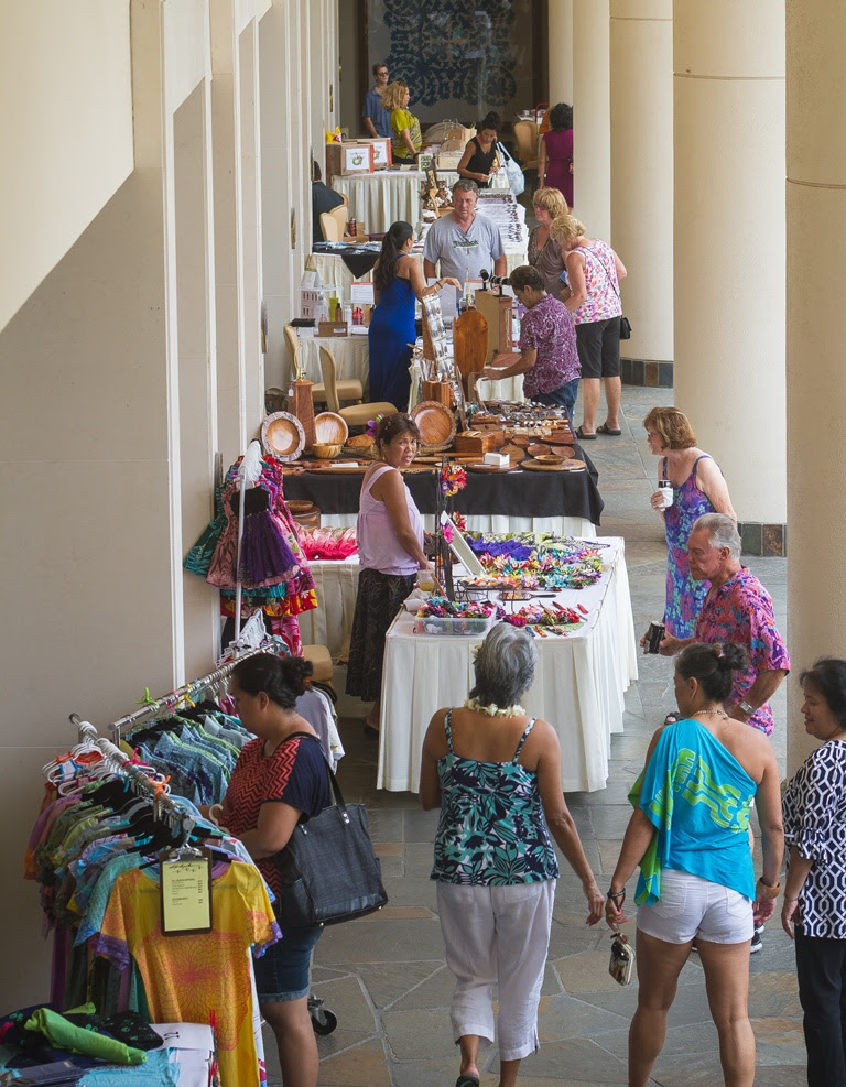 Local vendors sell a variety of products, including clothes, crafts, food and more. Mauna Kea Resort photo.